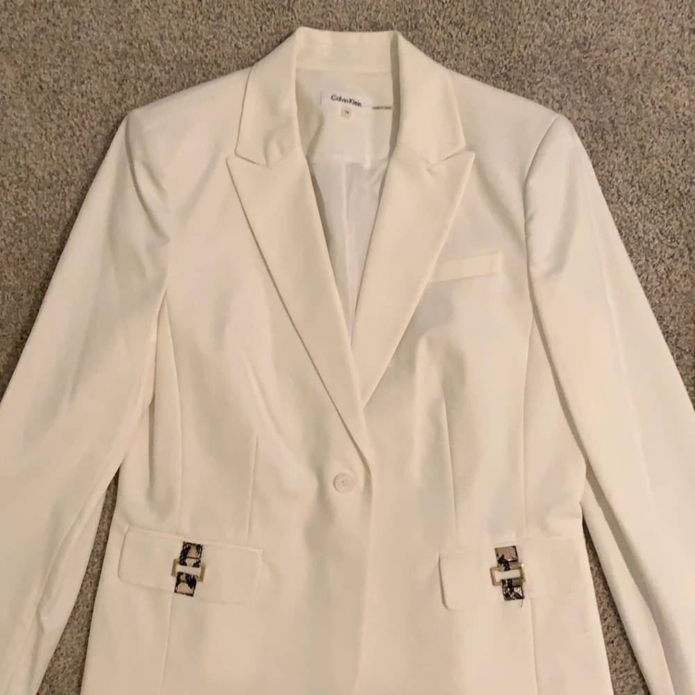 Calvin Klein cream colored suit; jacket and skirt. New, never worn.